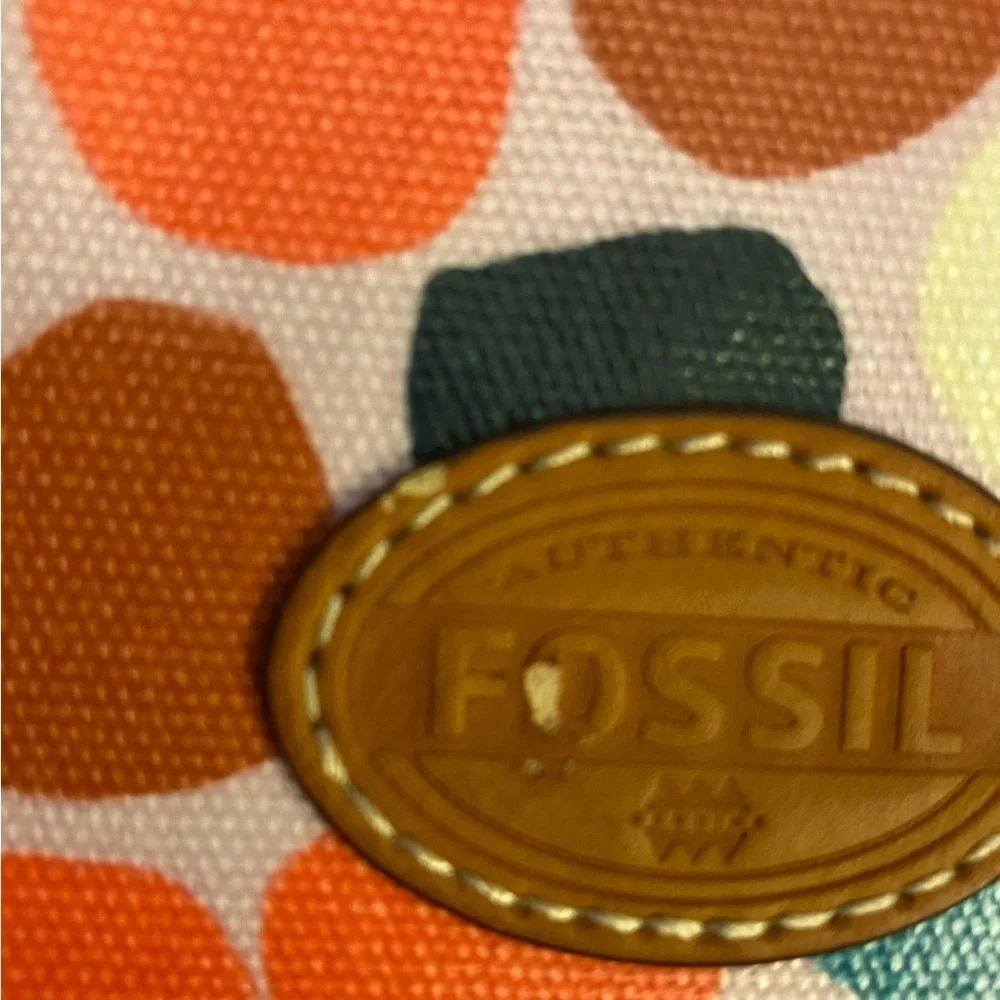Fossil wristlet pinkish with multicolored dots zippered closure card slots. OSP